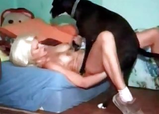 Horny blonde is porked by an insatiable doggo