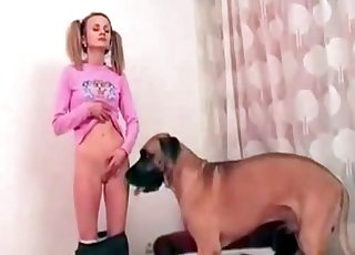 Loli-looking babe seduced by a dog