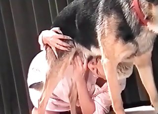 Short-haired zoophile blows a dog