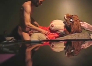 Scary man fucking a plush with a wet pussy