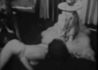 B&W zoophile classic with a hot lady taking it